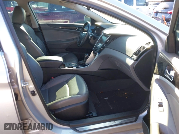 2013 Hyundai Sonata Limited with VIN 5NPEC4AB8DH805564, listed as a IAAI auction lot 41133553 with 99,410 mi miles and . Bid and sale history available at DreamBid. Image 5.