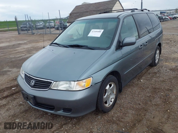 2000 Honda Odyssey EX z VIN 2HKRL1879YH516264, wystawiony jako IAAI lot #42109480 z przebiegiem 214 414 mil mil oraz . Historia ofert i sprzedaży dostępna na DreamBid. Obrazek 2.