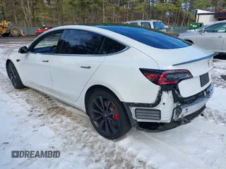 2020 Tesla Model 3 Performance z VIN 5YJ3E1EC5LF791879, wystawiony jako IAAI lot #41302692 z przebiegiem 76 502 mil mil oraz . Historia ofert i sprzedaży dostępna na DreamBid. Obrazek 3.