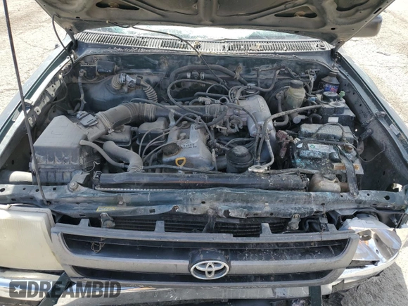 1999 Toyota Tacoma z VIN 4TANL42N3XZ501186, wystawiony jako Copart lot #50843715 z przebiegiem 323 347 mil mil oraz Nie do naprawy • Non repairable. Historia ofert i sprzedaży dostępna na DreamBid. Obrazek 11.