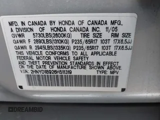 2006 Acura MDX Touring RES w/Navi with VIN 2HNYD18926H511319, listed as a IAAI auction lot 41802256 with 216,637 mi miles. Bid and sale history available at carsss.com. Image 9.