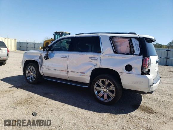 2018 GMC Yukon Denali with VIN 1GKS1CKJ8JR231789, listed as a Copart auction lot 45655024 with 76,085 mi miles and Salvage Title. Bid and sale history available at DreamBid. Image 2.