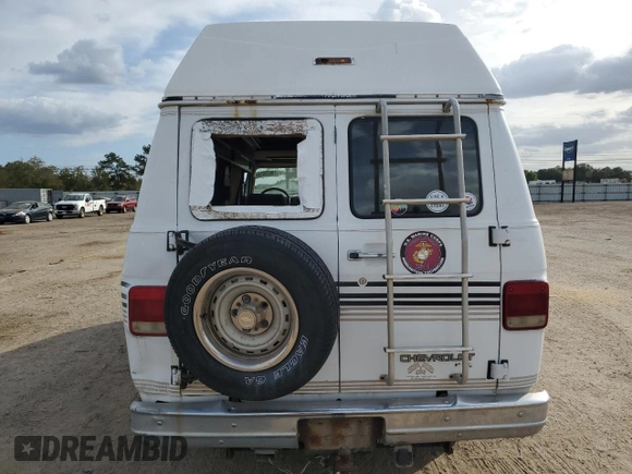1995 Chevrolet Chevy Van с VIN 1GBEG25K1SF128372, выставлен на аукционе Copart как лот 78600654 с пробегом 183 522 миль миль и Списание • Salvage title. История ставок и продаж доступна на DreamBid. Изображение 6.