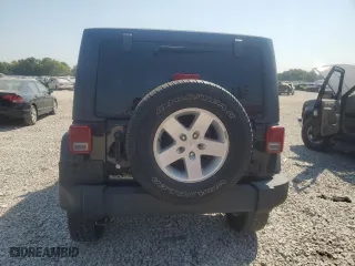 2018 Jeep Wrangler JK Unlimited Sport S with VIN 1C4BJWDG4JL810926, listed as a Copart auction lot 72987394 with 72,213 mi miles and Salvage Title. Bid and sale history available at carsss.com. Image 6.