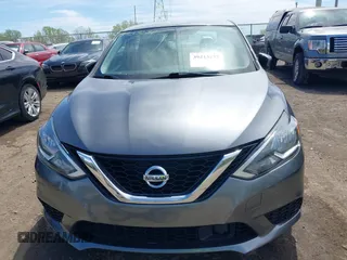 2019 Nissan Sentra S with VIN 3N1AB7AP3KY293231, listed as a IAAI auction lot 39213237 with 102,788 mi miles and . Bid and sale history available at DreamBid. Image 12.
