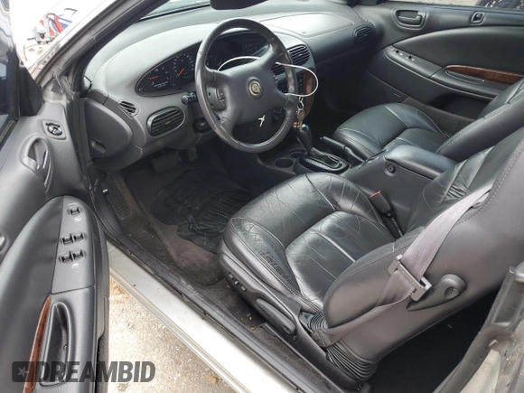 2000 Chrysler Sebring JXi z VIN 3C3EL55H7YT271942, wystawiony jako Copart lot #57423345 z przebiegiem 116 504 mil mil oraz Szkoda całkowita • Salvage title. Historia ofert i sprzedaży dostępna na DreamBid. Obrazek 8.