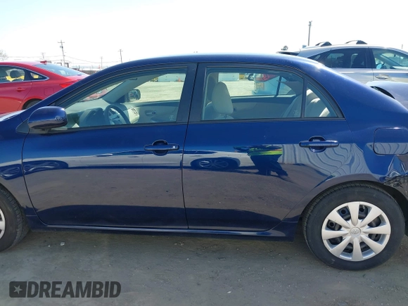 2011 Toyota Corolla L with VIN JTDBU4EE9B9167657, listed as a IAAI auction lot 41970387 with 89,300 mi miles. Bid and sale history available at carsss.com. Image 15.