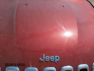 2015 Jeep Cherokee Sport z VIN 1C4PJLABXFW517597, wystawiony jako Copart lot #51459265 z przebiegiem Nie podano mil oraz Szkoda całkowita • Salvage title. Historia ofert i sprzedaży dostępna na DreamBid. Obrazek 13.