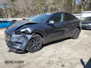 2024 Tesla Model Y Long Range z VIN 7SAYGDEE3RA323029, wystawiony jako Copart lot #50171805 z przebiegiem Nie podano mil oraz Szkoda całkowita • Salvage title. Historia ofert i sprzedaży dostępna na DreamBid. Obrazek 1.