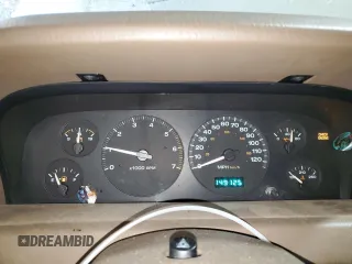 1999 Jeep Grand Cherokee Limited with VIN 1J4GW68N3XC799663, listed as a Copart auction lot 45630695 with 149,125 mi miles and Salvage Title. Bid and sale history available at carsss.com. Image 9.