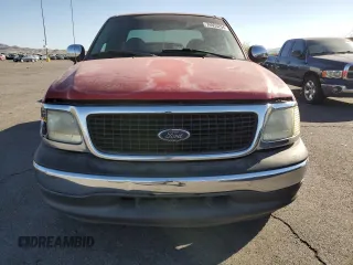 1999 Ford F-150 with VIN 1FTRX07W2XKC24186, listed as a Copart auction lot 74553294 with Not provided miles and Salvage title. Bid and sale history available at DreamBid. Image 5.