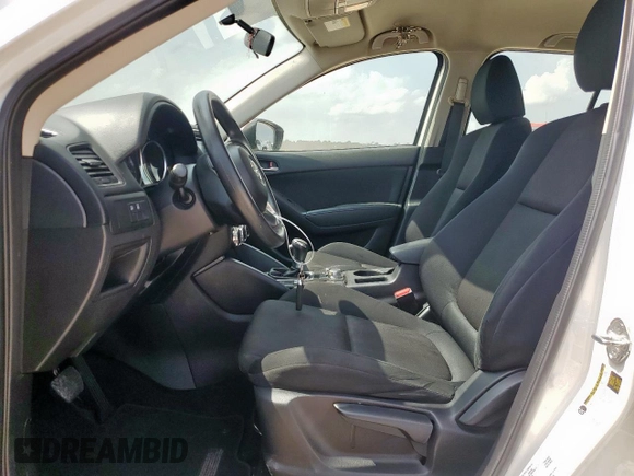 2016 Mazda CX-5 Sport with VIN JM3KE4BY0G0742436, listed as a Copart auction lot 59693945 with 74,314 mi miles and Salvage title. Bid and sale history available at DreamBid. Image 7.