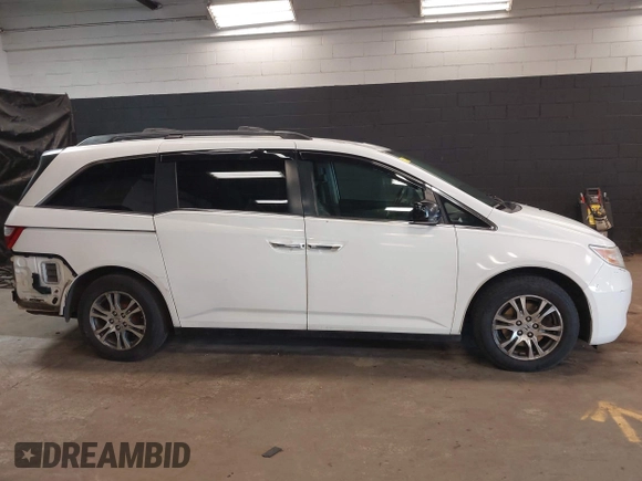2013 Honda Odyssey EX-L with VIN 5FNRL5H66DB071151, listed as a IAAI auction lot 41914345 with 194,804 mi miles and . Bid and sale history available at carsss.com. Image 13.
