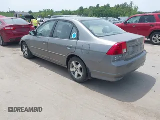 2005 Honda Civic EX z VIN 2HGES26795H559101, wystawiony jako IAAI lot #42306304 z przebiegiem 136 982 mil mil oraz . Historia ofert i sprzedaży dostępna na DreamBid. Obrazek 3.