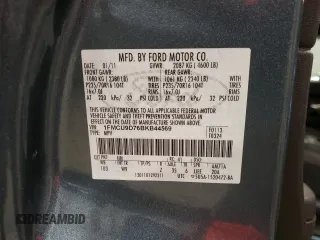 2011 Ford Escape XLT z VIN 1FMCU9D76BKB44569, wystawiony jako Copart lot #59340185 z przebiegiem 80 168 mil mil oraz Nie do naprawy • Non repairable. Historia ofert i sprzedaży dostępna na DreamBid. Obrazek 13.