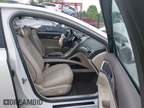 2016 Lincoln MKZ with VIN 3LN6L2G94GR633849, listed as a IAAI auction lot 42157808 with 118,678 mi miles and . Bid and sale history available at carsss.com. Image 5.
