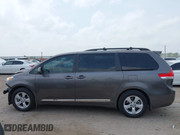 2013 Toyota Sienna LE AAS with VIN 5TDKK3DC1DS392577, listed as a IAAI auction lot 41932168 with 90,643 mi miles and . Bid and sale history available at DreamBid. Image 14.