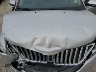 2013 Lincoln MKX z VIN 2LMDJ8JKXDBL48003, wystawiony jako Copart lot #53099295 z przebiegiem 168 181 mil mil oraz Szkoda całkowita • Salvage title. Historia ofert i sprzedaży dostępna na DreamBid. Obrazek 14.