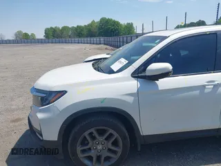 2023 Honda Passport EX-L z VIN 5FNYF8H57PB006499, wystawiony jako IAAI lot #42036371 z przebiegiem 51 404 mil mil oraz . Historia ofert i sprzedaży dostępna na DreamBid. Obrazek 18.