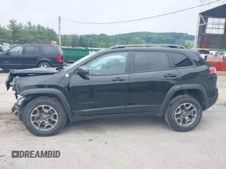 2021 Jeep Cherokee Trailhawk with VIN 1C4PJMBX0MD167941, listed as a IAAI auction lot 42507379 with 70,414 mi miles and . Bid and sale history available at DreamBid. Image 15.
