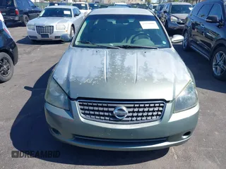 2006 Nissan Altima SE z VIN 1N4BL11DX6N401712, wystawiony jako IAAI lot #42350080 z przebiegiem 170 888 mil mil oraz . Historia ofert i sprzedaży dostępna na DreamBid. Obrazek 6.