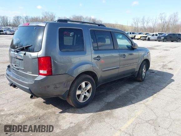 2011 Honda Pilot EX-L with VIN 5FNYF4H51BB065906, listed as a IAAI auction lot 41956370 with 233,977 mi miles and . Bid and sale history available at DreamBid. Image 4.