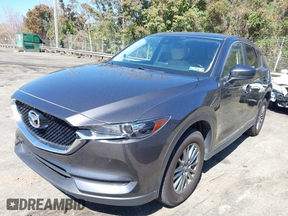 2017 Mazda CX-5 Touring with VIN JM3KFBCL2H0203497, listed as a IAAI auction lot 41860782 with 65,482 mi miles. Bid and sale history available at carsss.com. Image 17.