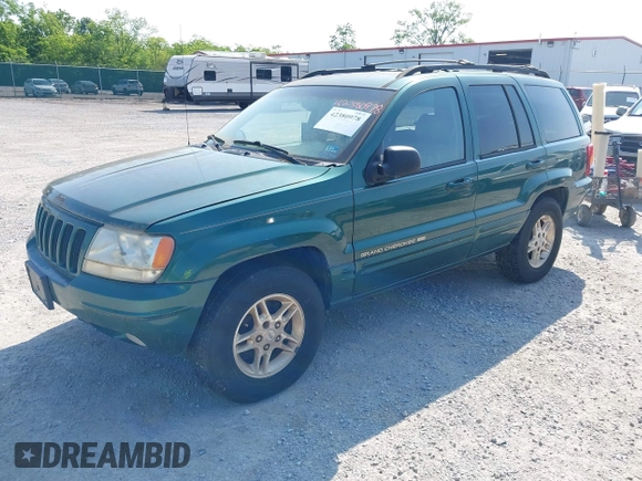1999 Jeep Grand Cherokee Limited z VIN 1J4GW68N5XC630910, wystawiony jako IAAI lot #42380978 z przebiegiem 188 300 mil mil oraz . Historia ofert i sprzedaży dostępna na DreamBid. Obrazek 2.