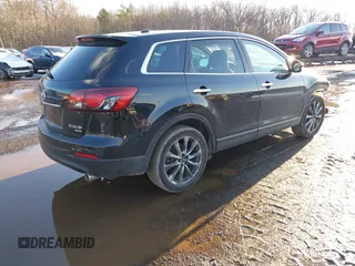 2014 Mazda CX-9 Grand Touring with VIN JM3TB3DV4E0444558, listed as a IAAI auction lot 41538130 with 113,050 mi miles and . Bid and sale history available at DreamBid. Image 4.