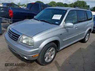 2003 Suzuki XL7 Touring z VIN JS3TY92V934101118, wystawiony jako IAAI lot #42425129 z przebiegiem 175 455 mil mil oraz . Historia ofert i sprzedaży dostępna na DreamBid. Obrazek 2.
