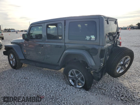 2020 Jeep Wrangler Unlimited Sahara Altitude with VIN 1C4HJXEG2LW206453, listed as a Copart auction lot 82303434 with 51,559 mi miles and Salvage title. Bid and sale history available at DreamBid. Image 2.