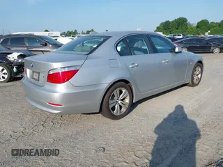 2009 BMW 5 Series 528i with VIN WBANU53569C122711, listed as a IAAI auction lot 42082909 with 157,581 mi miles and . Bid and sale history available at carsss.com. Image 4.