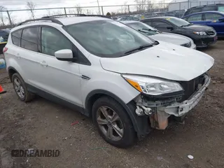 2013 Ford Escape SE z VIN 1FMCU0GX7DUB29125, wystawiony jako IAAI lot #41125704 z przebiegiem 200 690 mil mil oraz . Historia ofert i sprzedaży dostępna na DreamBid. Obrazek 1.