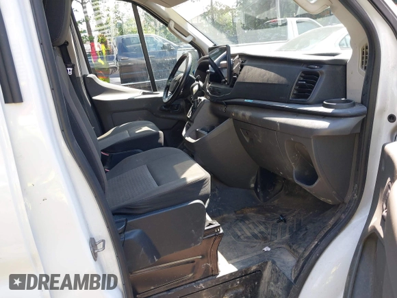 2022 Ford Transit Cargo z VIN 1FTBR3XG4NKA04700, wystawiony jako IAAI lot #42753263 z przebiegiem 80 467 mil mil oraz . Historia ofert i sprzedaży dostępna na DreamBid. Obrazek 5.