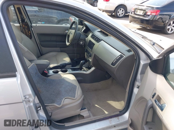 2011 Ford Focus SES with VIN 1FAHP3GN2BW180198, listed as a IAAI auction lot 42121335 with 162,826 mi miles. Bid and sale history available at carsss.com. Image 5.