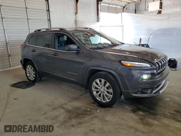 2018 Jeep Cherokee Overland with VIN 1C4PJMJXXJD594749, listed as a Copart auction lot 56049145 with 178,471 mi miles and Salvage title. Bid and sale history available at DreamBid. Image 4.