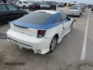 2000 Toyota Celica GTS z VIN JTDDY32T2Y0015579, wystawiony jako IAAI lot #41548735 z przebiegiem Nie podano mil oraz . Historia ofert i sprzedaży dostępna na DreamBid. Obrazek 4.