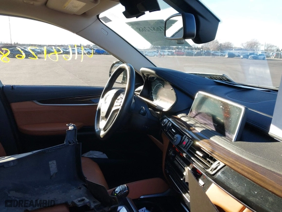 2015 BMW X6 xDrive35i with VIN 5UXKU2C50F0N77926, listed as a IAAI auction lot 41681268 with 136,118 mi miles. Bid and sale history available at carsss.com. Image 5.