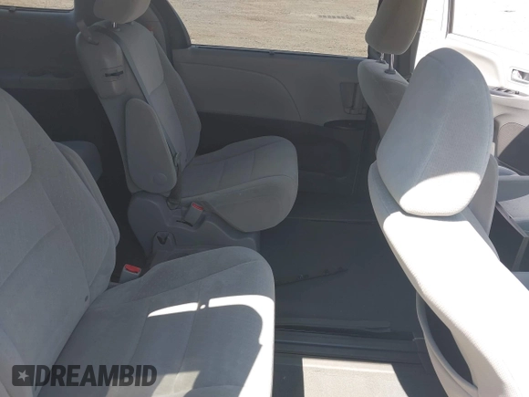 2015 Toyota Sienna LE AAS with VIN 5TDKK3DC1FS599053, listed as a IAAI auction lot 42216805 with 167,280 mi miles and . Bid and sale history available at DreamBid. Image 8.