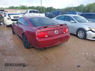 2006 Ford Mustang GT Deluxe with VIN 1ZVFT82H265195370, listed as a IAAI auction lot 42018364 with 129,165 mi miles. Bid and sale history available at carsss.com. Image 3.
