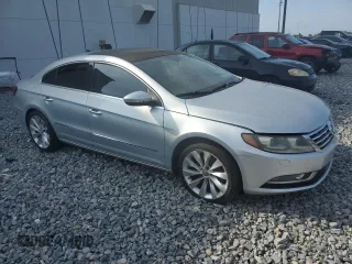 2013 Volkswagen CC Lux z VIN WVWHU7AN3DE500737, wystawiony jako Copart lot #56109175 z przebiegiem 135 579 mil mil oraz Tytuł czysty. Historia ofert i sprzedaży dostępna na DreamBid. Obrazek 4.
