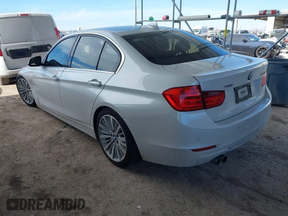 2013 BMW 3 Series 328i xDrive with VIN WBA3B3G53DNR79514, listed as a IAAI auction lot 41662949 with 104,125 mi miles. Bid and sale history available at carsss.com. Image 3.
