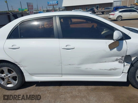 2013 Toyota Corolla L with VIN 2T1BU4EE4DC981499, listed as a IAAI auction lot 42052280 with 111,153 mi miles. Bid and sale history available at carsss.com. Image 13.