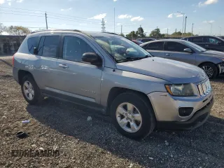 2015 Jeep Compass Sport with VIN 1C4NJCBA9FD198041, listed as a Copart auction lot 50901245 with 77,091 mi miles and Salvage Title. Bid and sale history available at carsss.com. Image 4.
