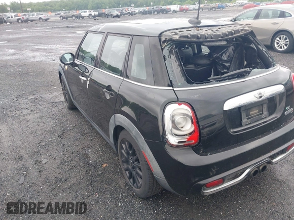 2015 MINI Hardtop 4 Door S with VIN WMWXU3C55F2B56429, listed as a IAAI auction lot 42335996 with 114,781 mi miles and . Bid and sale history available at DreamBid. Image 3.
