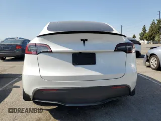2024 Tesla Model Y с VIN 7SAYGDED6RF109727, выставлен на аукционе Copart как лот 59038725 с пробегом 14 948 миль миль и Списание • Salvage title. История ставок и продаж доступна на DreamBid. Изображение 6.