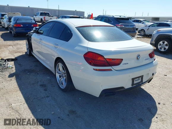 2014 BMW 6 Series 650i xDrive with VIN WBA6B4C5XED099197, listed as a IAAI auction lot 41744557 with 174,613 mi miles. Bid and sale history available at carsss.com. Image 3.