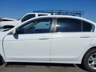 2009 Honda Accord LX-P with VIN 1HGCP26469A157796, listed as a IAAI auction lot 42270687 with 180,061 mi miles and . Bid and sale history available at DreamBid. Image 14.