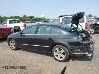 2013 Volkswagen CC Sport Plus z VIN WVWBP7AN3DE524615, wystawiony jako Copart lot #57506575 z przebiegiem 153 641 mil mil oraz Szkoda całkowita • Salvage title. Historia ofert i sprzedaży dostępna na DreamBid. Obrazek 2.