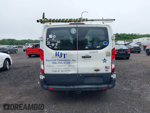 2018 Ford Transit with VIN 1FTYR1ZM1JKB18598, listed as a IAAI auction lot 42533470 with 215,015 mi miles and . Bid and sale history available at DreamBid. Image 16.